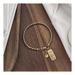 MAŁA ZŁOTA Z BLASZKĄ TŁOCZONĄ